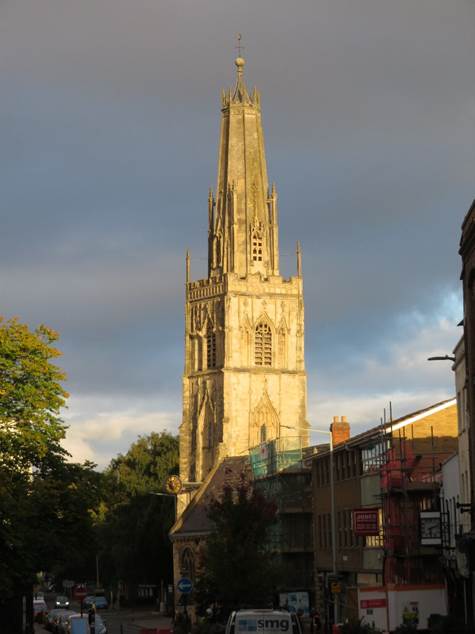 A tall building with a tower

AI-generated content may be incorrect.